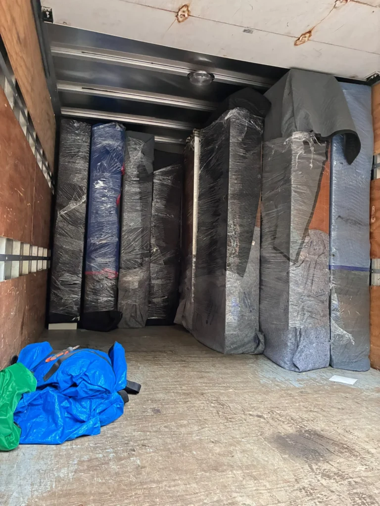 Furniture wrapped inside Isol Moving Truck